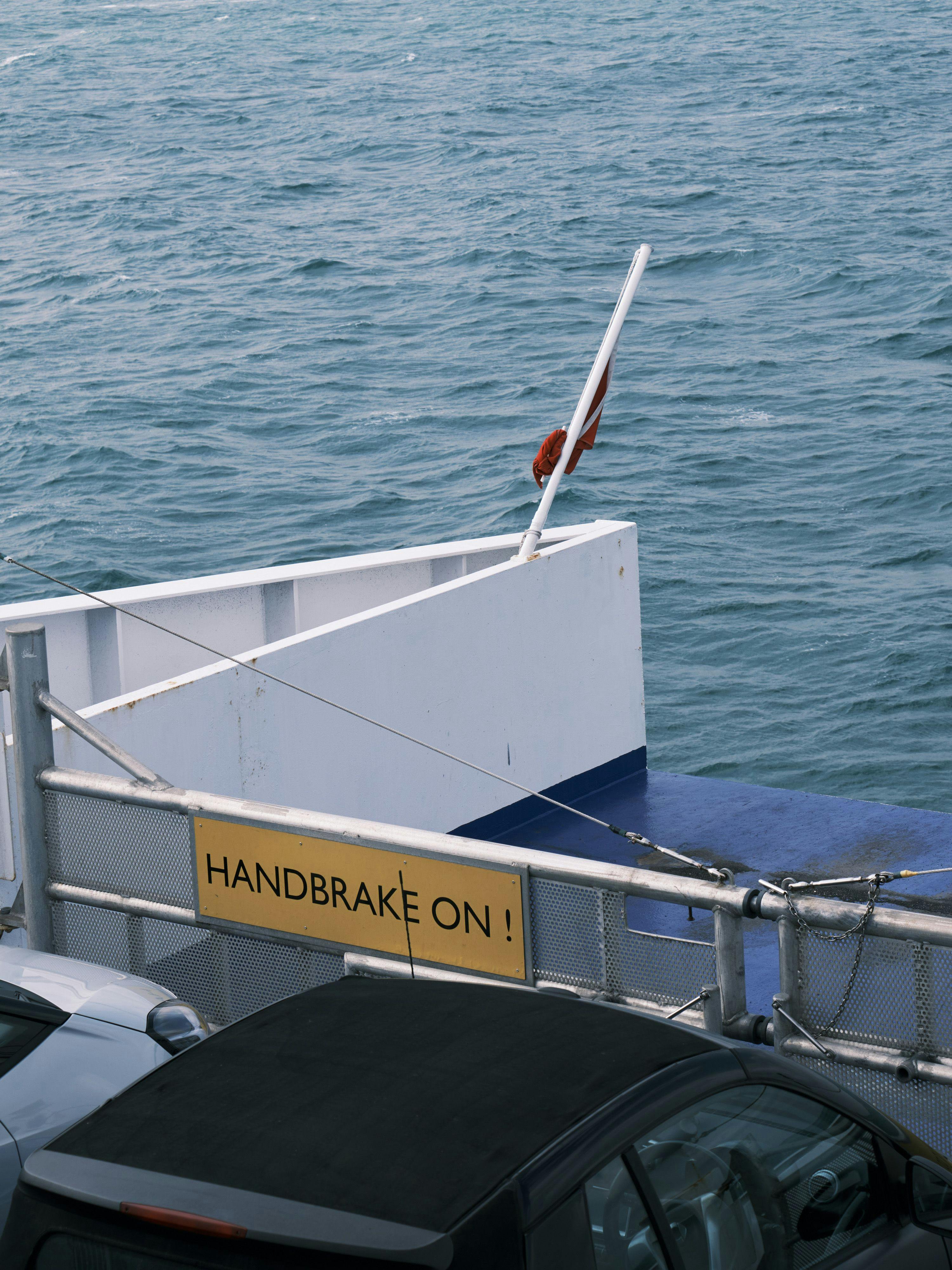 Shot of the ferry bow with a sign "handbrake on"